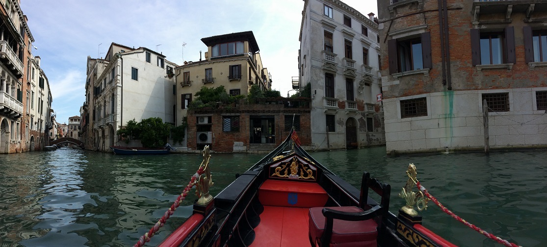 On a gondola ride through Venice