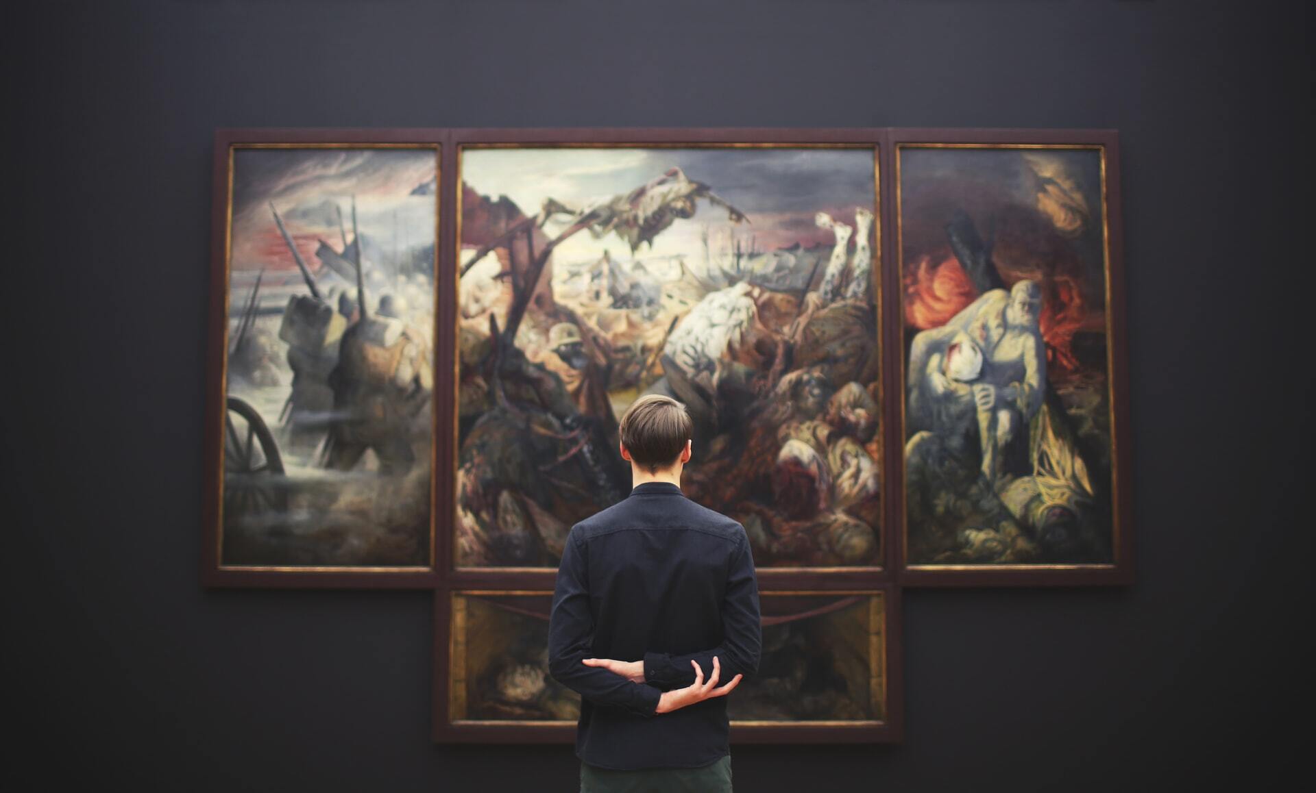 Visitor marvels at painting